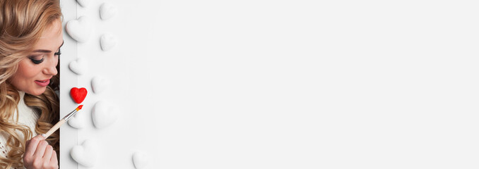 Smiling woman with painted heart