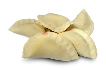 Pile of frozen dumplings isolated on white background. Isolated dumplings with shadow. Heap frozen dumplings on a white background. Russian homemade dumplings on a white background.