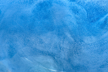 Fototapeta na wymiar Abstract liquid blue ocean background with bubbles. Fresh underwater backdrop
