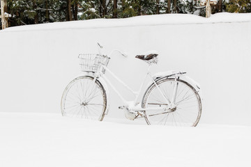 Snowy white retro bicycle. Beautiful winter.