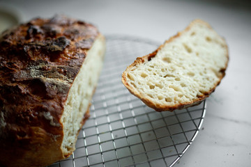 Sliced loaf of home made artisanal bread