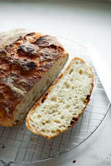 Sliced loaf of home made artisanal bread