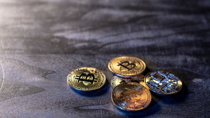 bitcoin coins on a wooden surface