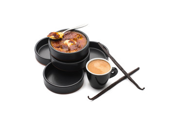 Crème brûlée with broken caramel coffee and vanilla, white background