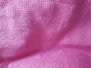 Fototapeta na wymiar pink silk surface Looks elegant, used for making a craft background.