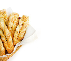 Puff pastry with sesame and cumin isolated on white background with clipping path. Copy space