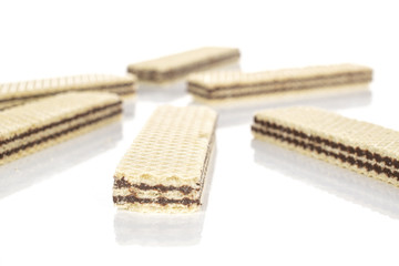 Group of six whole crispy sweet chocolate biscuit wafer isolated on white background