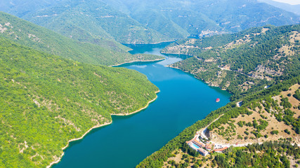 Fototapeta na wymiar Aerial view on Green hills around Vacha dam.
