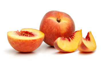 Fototapeta na wymiar Ripe peach fruit with slice isolated