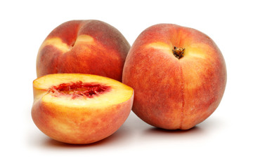 Fototapeta na wymiar Ripe peach fruit with slice isolated