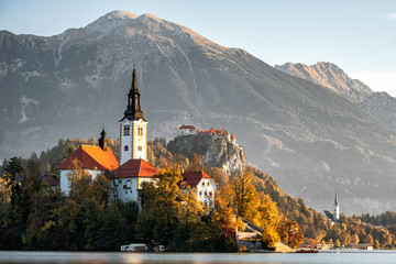 Lake Bled zoomed up with Stol mountains, Bled castle and Bled church on a beautiful fall autumn morning