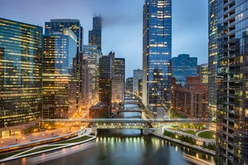 Foto op Aluminium Chicago downtown skyline taken at Wolf Point in a fantastic cloudy evening, with lights of the skyscrapers reflected in the Chicago river, Illinois, United States © cittadinodelmondo