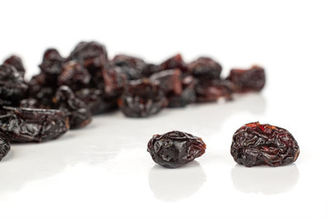 Lot of whole dried cowberry................ front focus isolated on white background