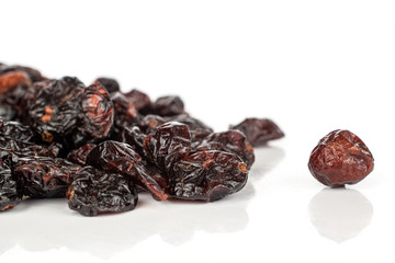 Lot of whole dried cowberry................ heap isolated on white background