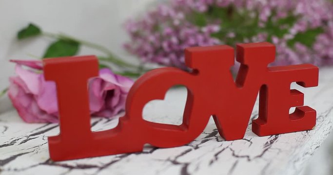wedding table decoration with flowers, flower decoration wedding table, wedding florist, wedding at the table is Pano with letters and monograms, rose flowers and white orchid