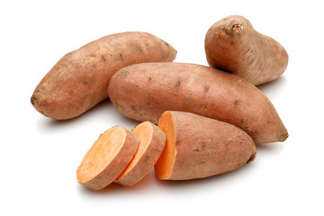 Raw sweet potato with slice isolated