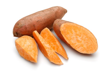 Raw sweet potato with slice isolated