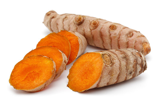 Fresh turmeric and slices isolated