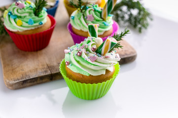 Close-up homemade delicious Christmas muffins on a white background. Traditional sweet dessert. Isolated composition. Close-up
