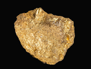 macro Gold ore in the boulder , precious stone on black background