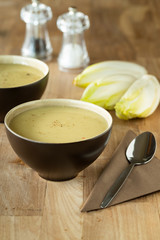 bowl of Chicory soup on wooden table