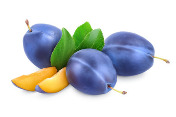 fresh blue plum and slices with leaves isolated on white background