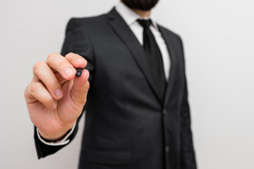 Male human with beard wear formal working suit clothes raising one hand up