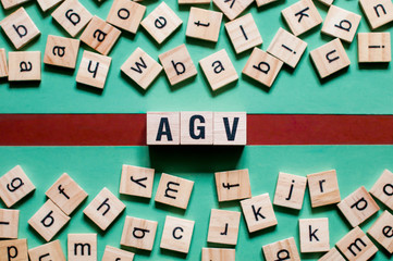 AGV - automated guided vehicle,word concept on cubes