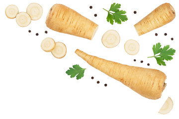 Parsnip root and slices with parsley peppercorns isolated on white background with copy space for your text. Top view. Flat lay,