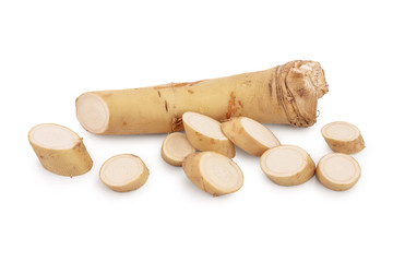 Horseradish root with slices isolated on white background