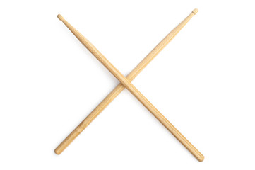 Drum sticks crossed on a white background.
