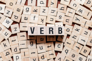 Verb word concept on cubes