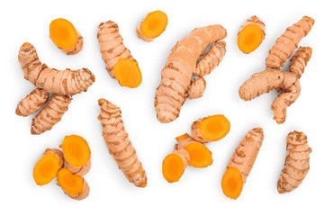 turmeric root and slices isolated on white background. Top view. Flat lay - obrazy, fototapety, plakaty