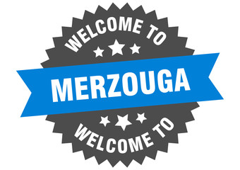 Merzouga sign. welcome to Merzouga blue sticker