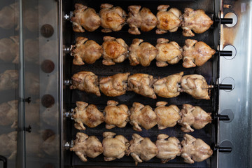 Roast chickens on roasting machine