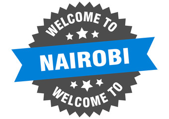 Fototapeta premium Nairobi sign. welcome to Nairobi blue sticker