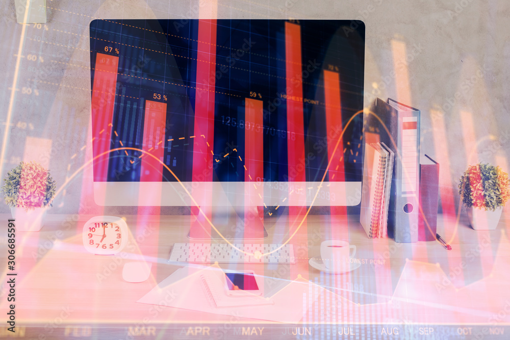 Wall mural forex graph hologram on table with computer background. double exposure. concept of financial market