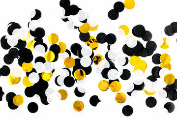 Colorful paper confetti on white background. Celebration concept. Flat lay. Top view.