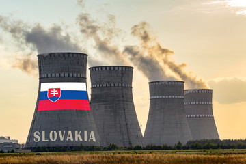 Nuclear plant chimneys displaying flag of Slovakia with according text. Energy pollution accidents...