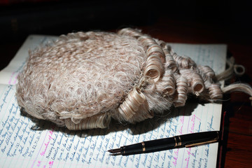 Close up of barrister's wig in spotlight