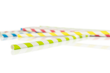 Fototapeta na wymiar Lot of whole colorful paper straw isolated on white background