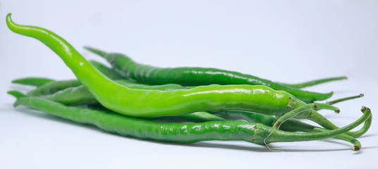 Fresh green chilli on white background