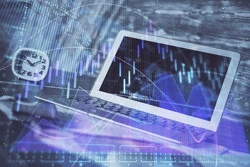 Financial market graph hologram and personal computer on background. Multi exposure. Concept of forex.