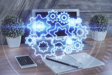 Multi exposure of business theme icons and work space with computer background. Concept of success.