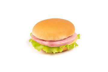Sandwich with ham, cheese, lettuce on white background.