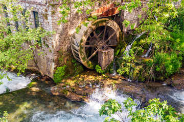 Old water mill in Livadeia, Greece © akarb