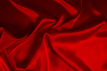 Plakat Red silk or satin luxury fabric texture can use as abstract background. Top view.