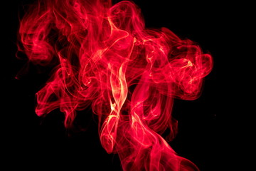 Obraz premium Red smoke on black background