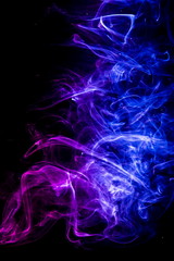 Colored smoke on black background