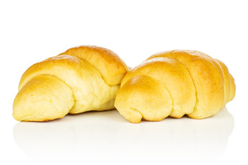 Group of two whole sweet golden mini croissant isolated on white background
